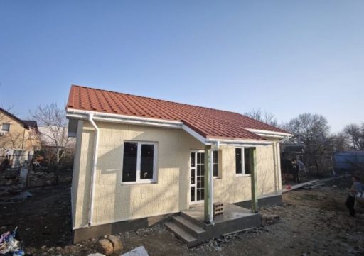 Наружная отделка дома из СИП в Севастополе. Проифасадные плиты.